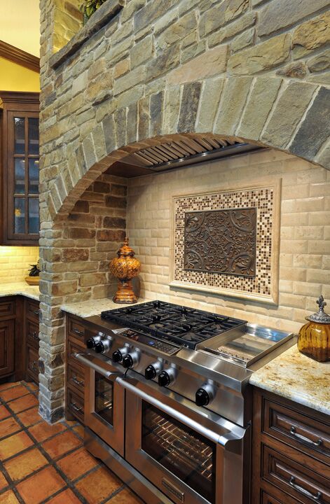 kitchen stove with stone arch remodel